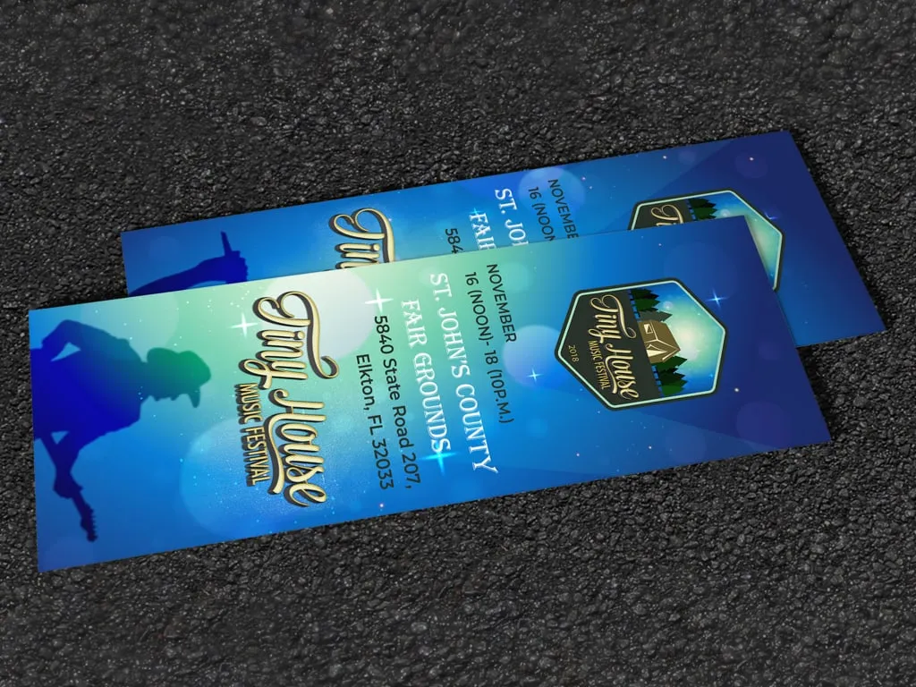 Festival tickets fanned out on asphalt